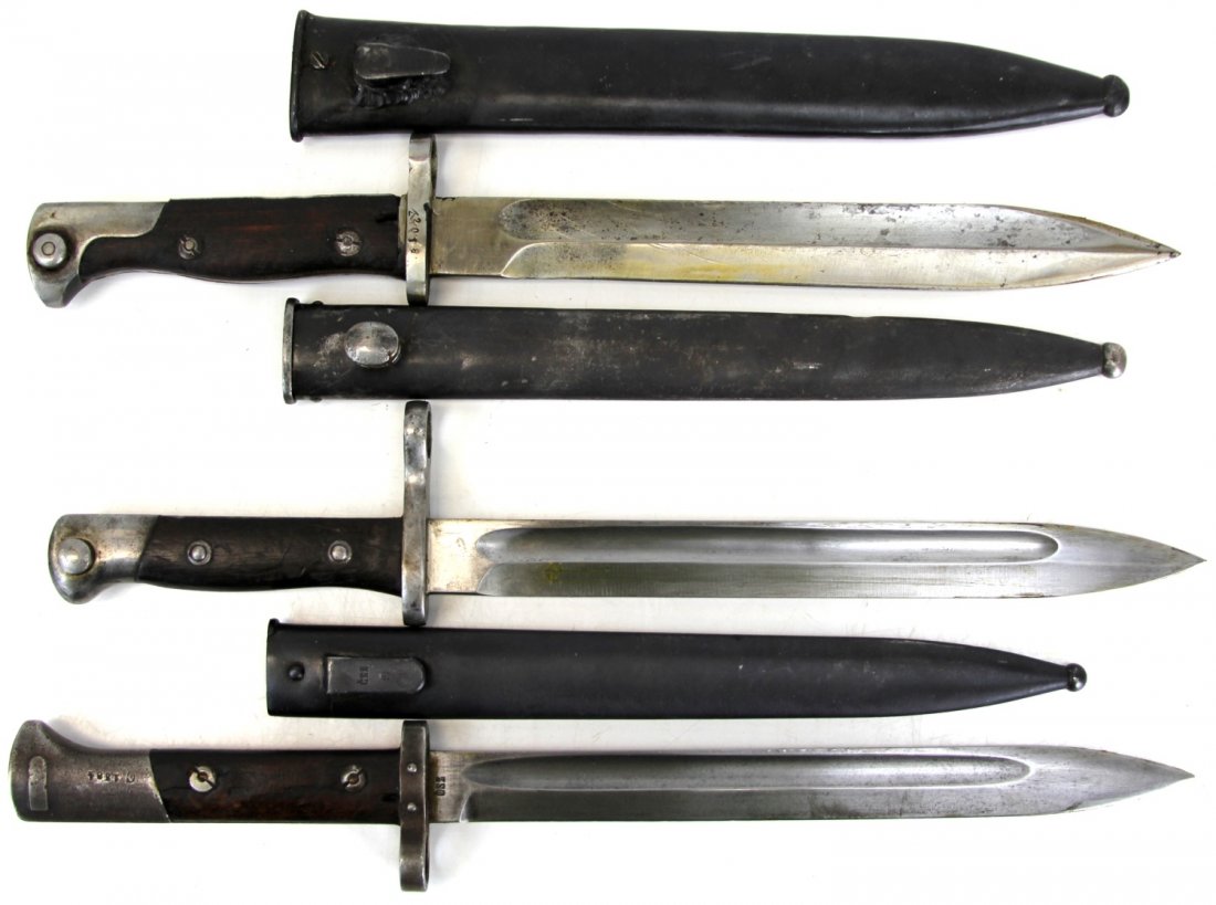 GROUPING OF THREE WWI MAUSER BAYONETS: GROUPING OF THREE WWI MAUSER BAYONETS Three WWI era Mauser bayonets. M1895 Mauser bayonet, by Weyersberg Kirschbaum 7 Co, Solingen; Czechoslovakian VZ-23 Mauser bayonet; M1898-style bayonet, marked "W
