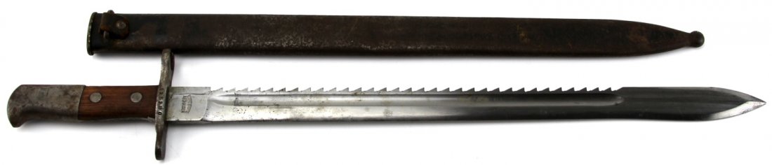 SWISS MODEL 1914 PIONEER SAWBACK BAYONET: SWISS MODEL 1914 PIONEER SAWBACK BAYONET Swiss Model 1914 Pioneer sawback bayonet. Issued to select troops for use with the Schmidt-Rubin M1911 carbine and M1931 Short Rifle (K31). Marked "WAFFENFABRI