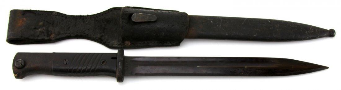WWII GERMAN K98 BAYONET WITH FROG: WWII GERMAN K98 BAYONET WITH FROGType: Bayonet Country: Germany Blade Length: 10" Overall Length: 15"PreSale Estimate: 100.00 - 200.00Condition Very good.