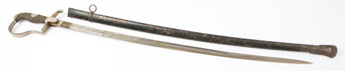 IMPERIAL GERMAN ETCHED OFFICERS SWORD EICKHORN: IMPERIAL GERMAN ETCHED OFFICERS SWORD EICKHORN Imperial German Army Officers sword, maker marked with Eickhorn double squirrel logo under langet. 31.5 inch blade, double etched to 14 inches with flora