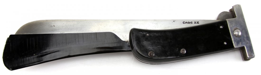 WWII CASE XX PILOT SURVIVAL FOLDING MACHETE: WWII CASE XX PILOT SURVIVAL FOLDING MACHETE Type: Knife Country: US Blade Length: 10" Overall Length: 15.5"
