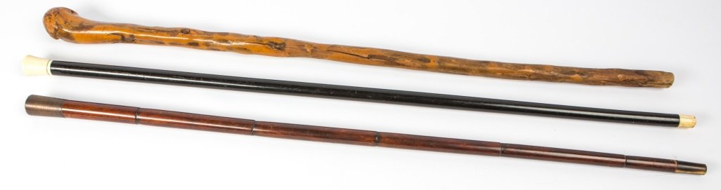 LOT OF 3 ANTIQUE DRESS CANES: LOT OF 3 ANTIQUE DRESS CANES 35.5" monogrammed ivory top and tip ebony dress cane, 34.5" shillelagh, 34" monogrammed silver top 3 piece cane with horn tip. From the personal effects of Thomas H. Windl