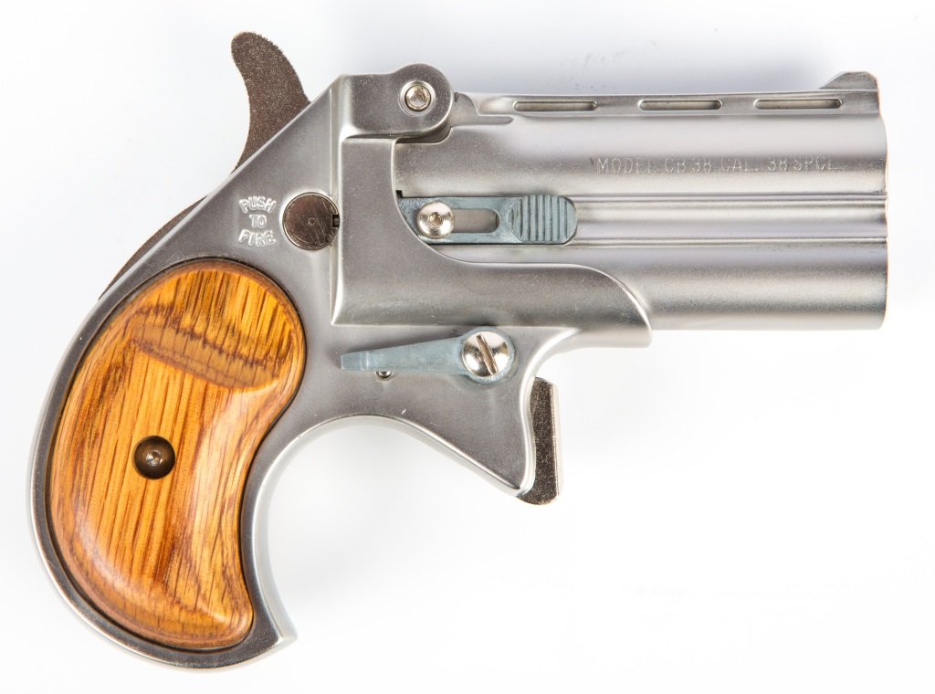 COBRA MODEL CB38 OVER UNDER DERRINGER .38 SPL: COBRA MODEL CB38 OVER UNDER DERRINGER .38 SPL Cobra Mode CB38 over under derringer .38 Special. Satin stainless finish. In original box with literature. Caliber / Gauge: .38 Spl Serial Number: ct02466