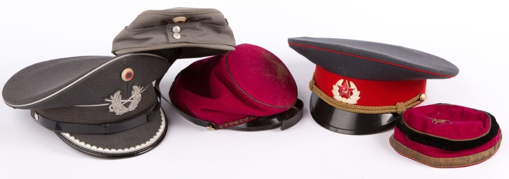 LOT OF COLD WAR MILITARY CAPS: LOT OF COLD WAR MILITARY CAPS USSR Officer's visor Circa 1971, gift to Wilton Persons from a Soviet Army General. West German Officer's visor and Alpine Corps cap 1980. 2 felt shakos Era / Conflict: C