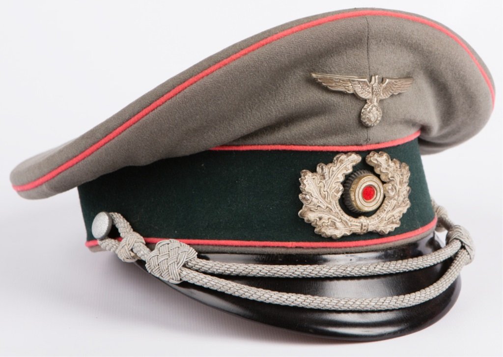 WWII GERMAN PANZER OFFICER PEAKED VISOR CAP: WWII GERMAN PANZER OFFICER PEAKED VISOR CAP Era / Conflict: WWII Country: Germany Provenance: From the collection of Robert D. Mitchell, who served in the U.S. Army from September 1976 thru February 2