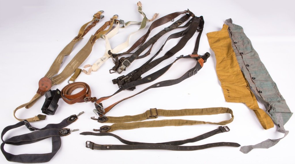WWII GERMAN STRAPS LARGE LOT: WWII GERMAN STRAPS LARGE LOT Tropical Y straps, leather Y straps, suspenders, GP strap, and more Era / Conflict: WWII Country: Germany Provenance: From the collection of Robert D. Mitchell, who served