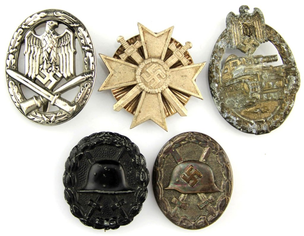 WWII GERMAN BADGE LOT OF 5: WWII GERMAN BADGE LOT OF 5 Tank assault, general assault, merit cross, and 2 wound badges Era / Conflict: WWII Country: Germany Provenance: From the collection of Robert D. Mitchell, who served in the
