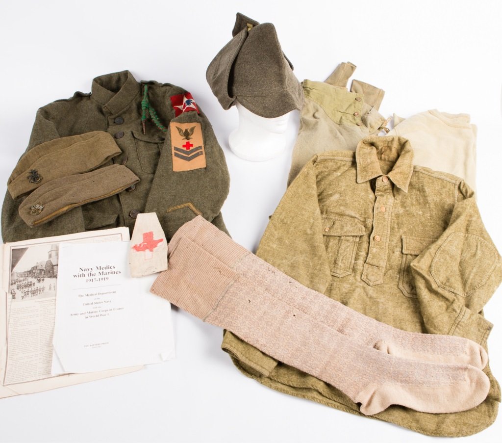 WWI NAMED USMC MEDIC UNIFORM ARCHIVE: WWI NAMED USMC MEDIC UNIFORM ARCHIVE WWI archive of Navy medic John Richarson including uniform jacket, 3 caps, armband, socks, wool drawers and sweater, and shirt Era / Conflict: WWI Country: US