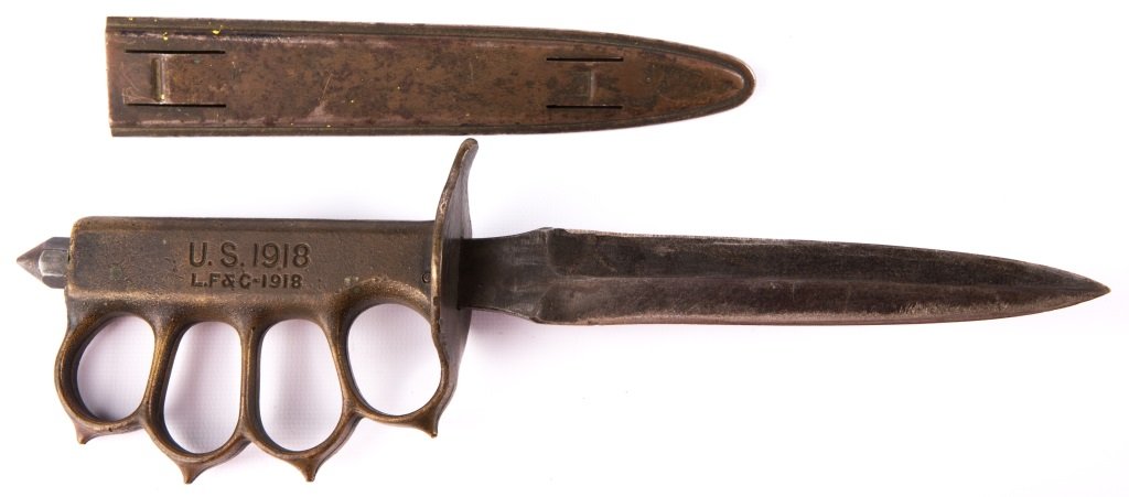 WWI L.F.&C. US 1918 KNUCKLE DUSTER TRENCH KNIFE: WWI L.F.&C. US 1918 KNUCKLE DUSTER TRENCH KNIFE Country: US Blade Length: 6.75" Overall Length: 11.5"