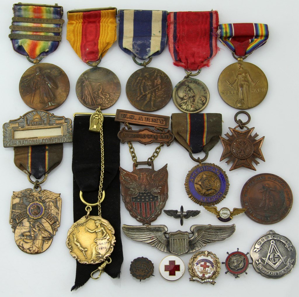WWI USAAF MEDAL ARCHIVE OF LOUIS FRED NOE: WWI USAAF MEDAL ARCHIVE OF LOUIS FRED NOE 6 WWI medals, WWII medal, sterling Masonic WWI medal, 3 American Legion medals, sterling wings and pin, USAAF Observer pin, WWI Army token, and 4 small pins.