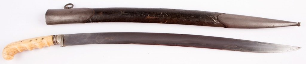 PERSIAN-SYRIAN YATAGHAN SWORD CIRCA 1800: PERSIAN-SYRIAN YATAGHAN SWORD CIRCA 1800 Irregular ivory grip. Decorated scabbard Blade Length: 19.5" Overall Length: 24.75"