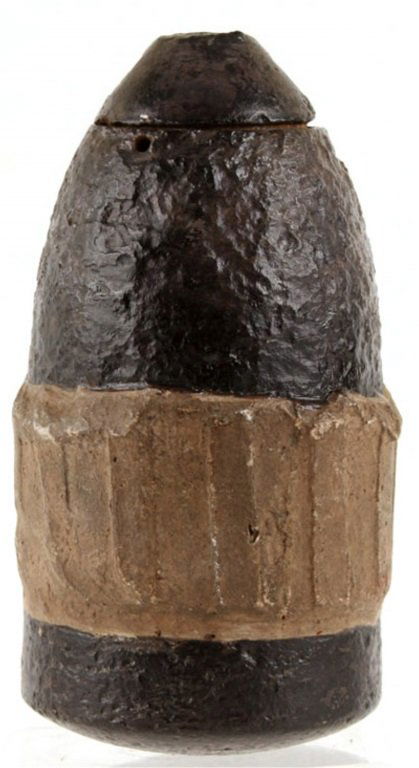 CIVIL WAR US HOTCHKISS CASE: CIVIL WAR US HOTCHKISS CASE 3.67" diameter. Screw-in fuse adapter. Molded putty driving band added for display. Size: 7.5" Provenance: Collection of lifelong relic hunter, Wilbur C. Bedall. Born in 19