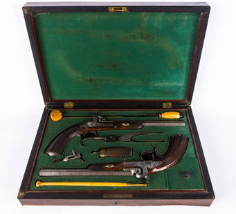 CASED PAIR OF PRESENTATION PISTOLS GUNTERMANN 1844: CASED PAIR OF PRESENTATION PISTOLS GUNTERMANN 1844 Cased pair of percussion pistols with accessories by Carl Guntermann Altstadt Dusseldorf 1844. Presented to Officer Reiten. Engraved wood and metal.