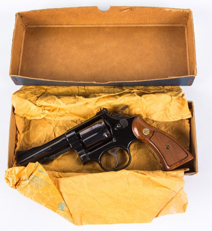 SMITH & WESSON MODEL 15-3 WITH ORIGINAL BOX: SMITH & WESSON MODEL 15-3 WITH ORIGINAL BOX Smith & Wesson Model 15-3 revolver, with original numbered box, wax paper, cleaning tools, and paperwork. Manufactured circa 1968. Target hammer and trigger