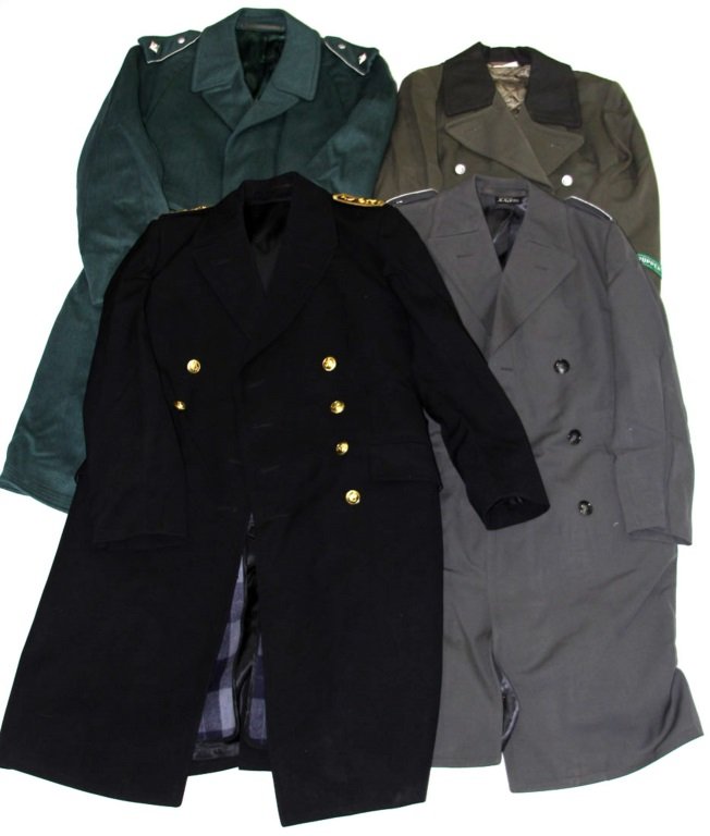 COLD WAR GERMAN TRENCH COAT LOT OF 4: COLD WAR GERMAN TRENCH COAT LOT OF 4 Condition: Very good. PreSale Estimate: 50.00 - 150.00