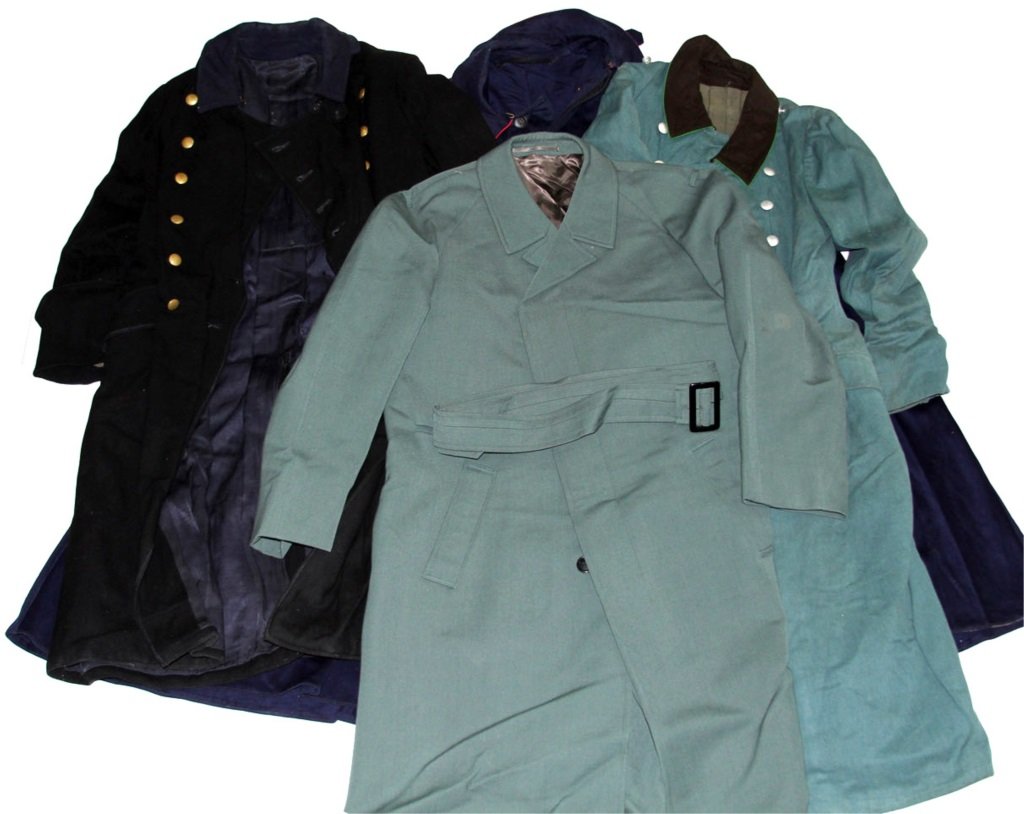 COLD WAR GERMAN TRENCH COAT LOT OF 4: COLD WAR GERMAN TRENCH COAT LOT OF 4 Condition: Very good. PreSale Estimate: 50.00 - 150.00