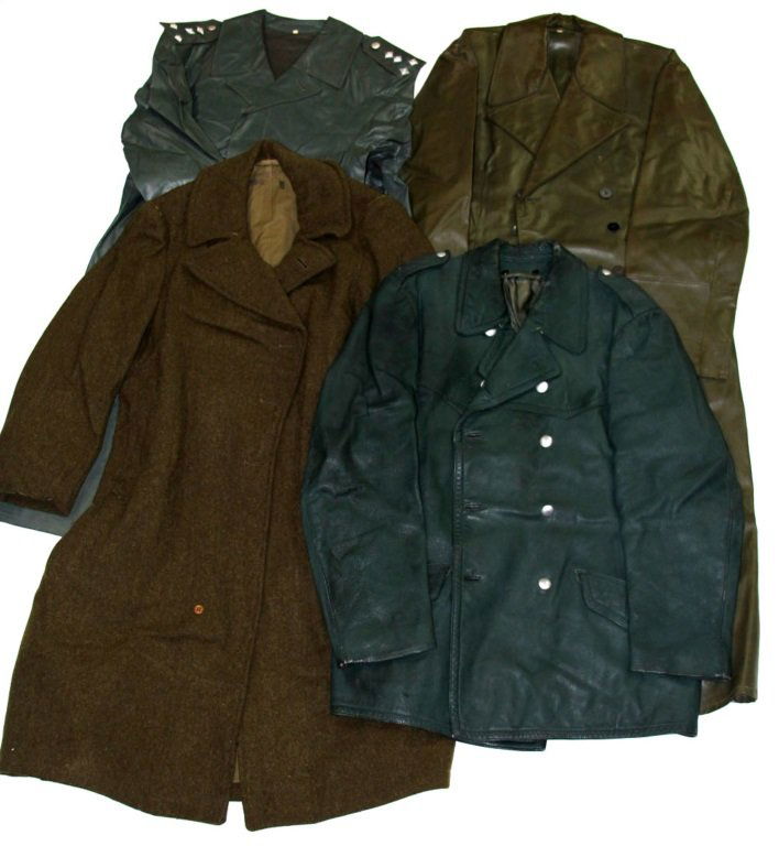 COLD WAR GERMAN TRENCH COAT LOT OF 4: COLD WAR GERMAN TRENCH COAT LOT OF 4 Condition: Very good. PreSale Estimate: 50.00 - 150.00