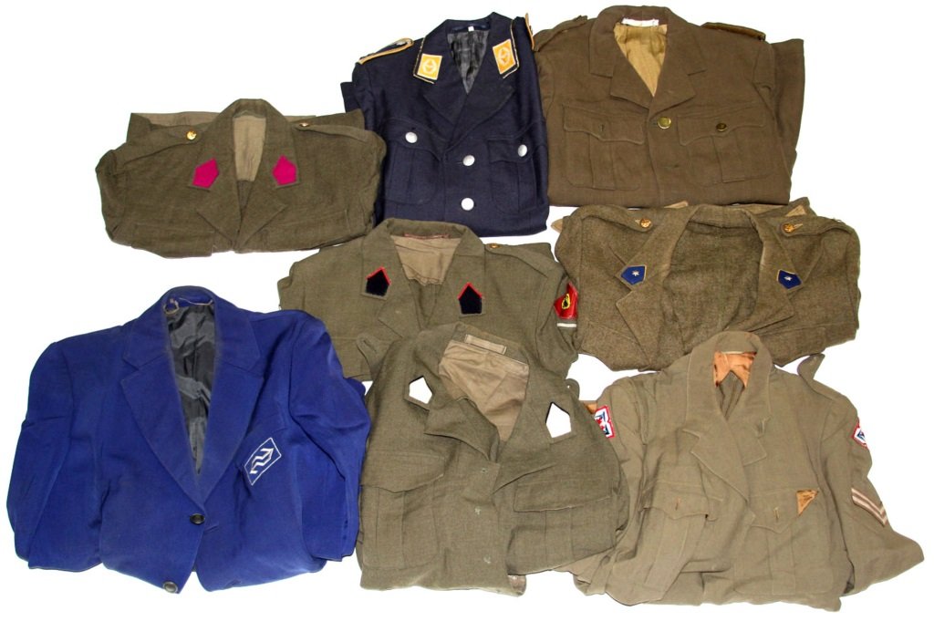 COLD WAR GERMAN MILITARY UNIFORM JACKET LOT OF 8: COLD WAR GERMAN MILITARY UNIFORM JACKET LOT OF 8 Condition: Very good. PreSale Estimate: 50.00 - 150.00