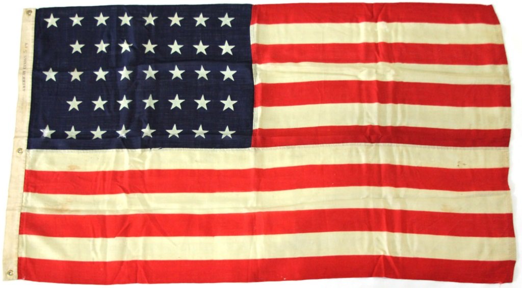 US 38 STAR 5 FT LINEN ENSIGN FLAG: US 38 STAR 5 FT LINEN ENSIGN FLAG Condition: Very good, some small holes. PreSale Estimate: 100.00 - 200.00