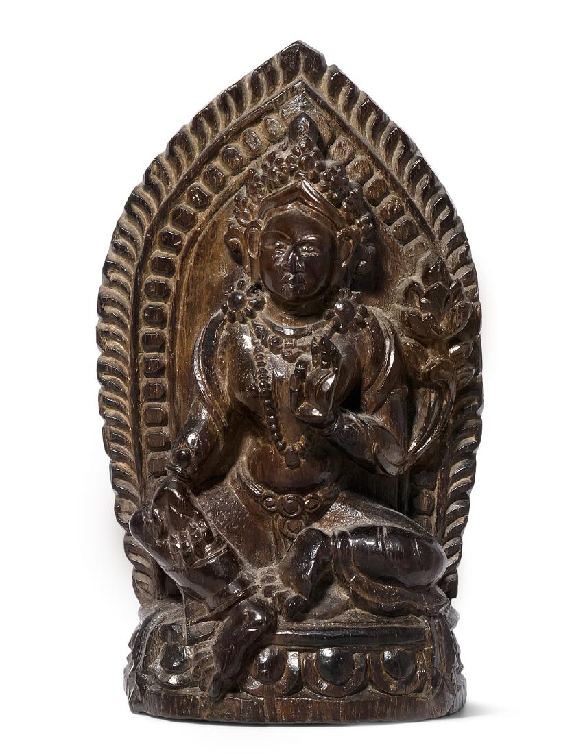 Votivfigur Tibet. 19./20.Jh. Zitan oder Ebenholz. Grüne (1 of 1)