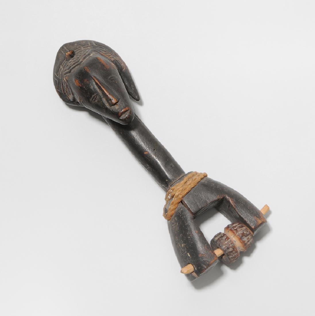 Webrollenhalter Guro. Elfenbeinküste. Dunkles Holz. (1 of 1)