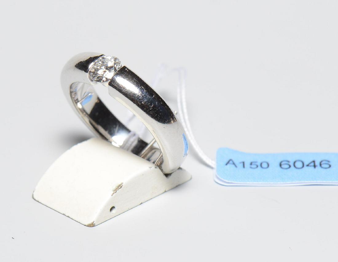 Solitaire 750 Weissgold. 1 Brillant ca. 0.34 ct H/I-si.: Solitaire 750 Weissgold. 1 Brillant ca. 0.34 ct H/I-si. Gr. 50, 7,7 g.