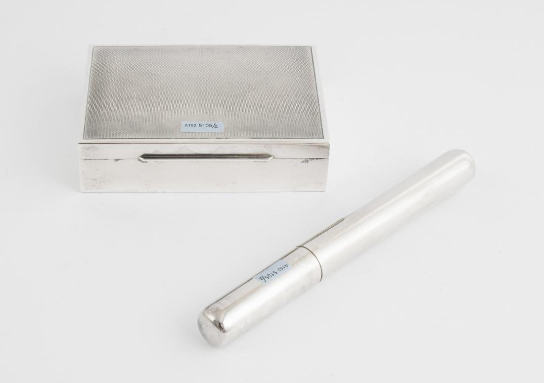 Zigarettendose: Schwäbisch Gmünd, 20.Jh. Silber. Meistermarke Gottlieb Kurz. Rechteckige Form mit guillochiertem Deckel. Inwendig mit Holz ausstaffiert. Halbmond/Krone, Herstellermarke, Feingehalt 925. 13,5x10x3,5