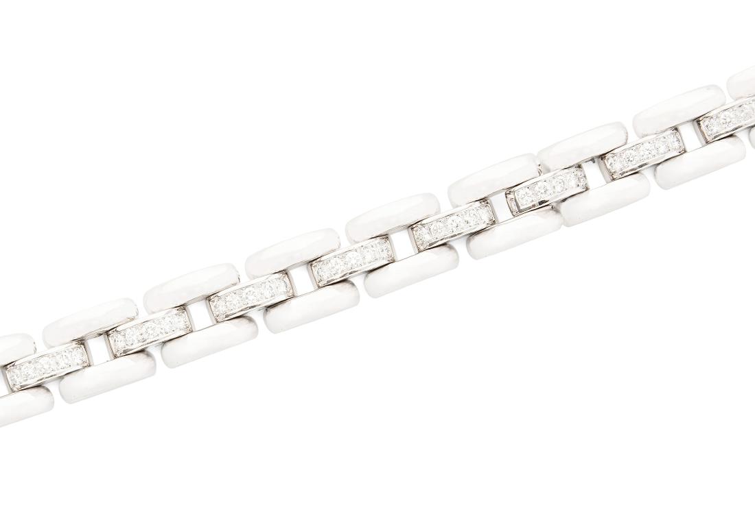 Chopard Brillant-Bracelet: 2000er Jahre. "Chopard 2144061 85/4069". Modell La Strada. 750 Weissgold. 80 Brillanten 1.80 ct. L 18,5 cm, B 9 mm. 44,5 g. Faktura, 2001.