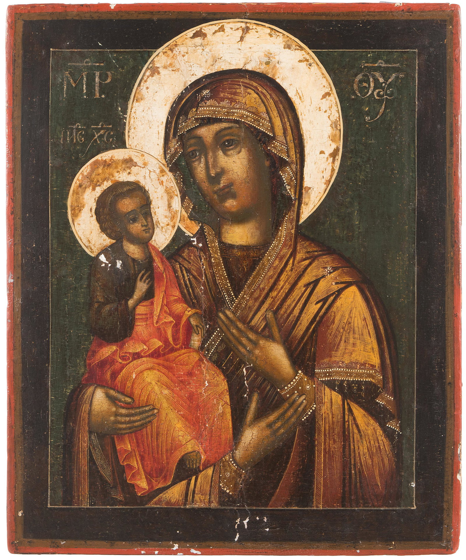Gottesmutter Tricherousa: (Nord-)Russisch, 19.Jh. Tempera über Kreidegrund auf Holz. Darstellung der Gottesmutter, das segnende Kind in ihrem rechten Arm haltend. Am unteren Bildrand ragt die Votivhand hervor. 31,5x25 cm.- Fa