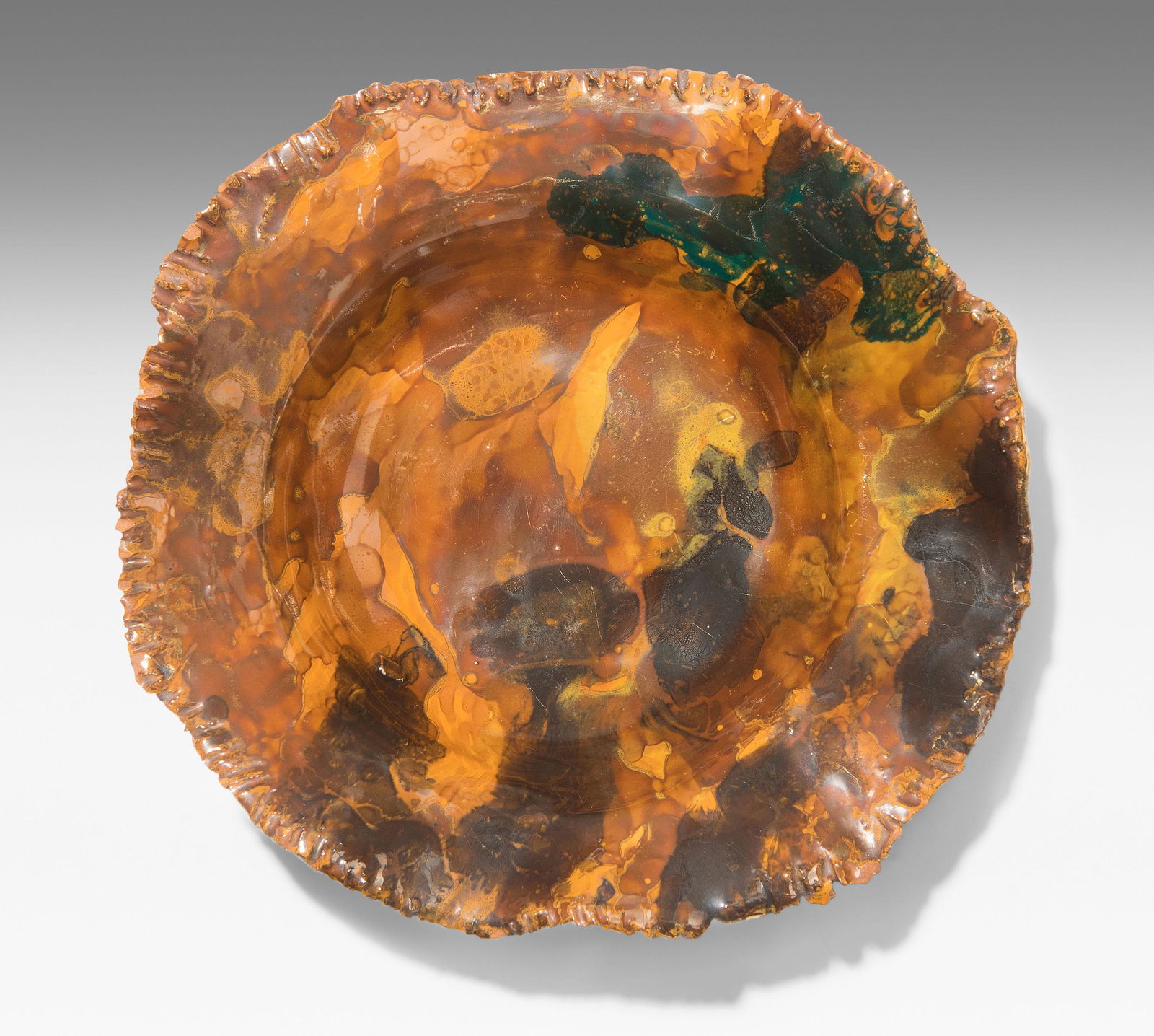 Fausto Melotti, kleiner Teller: (Rovereto 1901â€“1986 Mailand)Um 1950. Keramik, mehrfarbig glasiert. Im Stand signiert "Chantal (7 Punkte) ITALY" (gemalt). D 18,5 cm.- Leichte Altersspuren. Kleine Bestossungen (Rand).