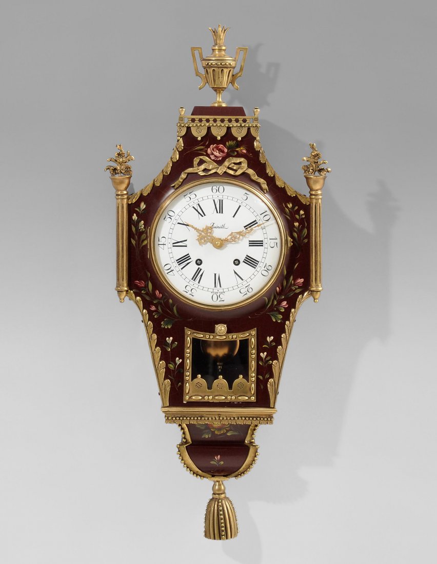 Wanduhr, Zenith Schweiz 20.Jh. Rotes, mit Rosen: Wanduhr, Zenith Schweiz 20.Jh. Rotes, mit Rosen bemaltes Holzgehäuse und mit Messingguss-Beschlägen verziert. Verglaste Ziffertüre in Messingring gefasst. Pendelsichtfenster. Ankerwochenwerk mit Hi