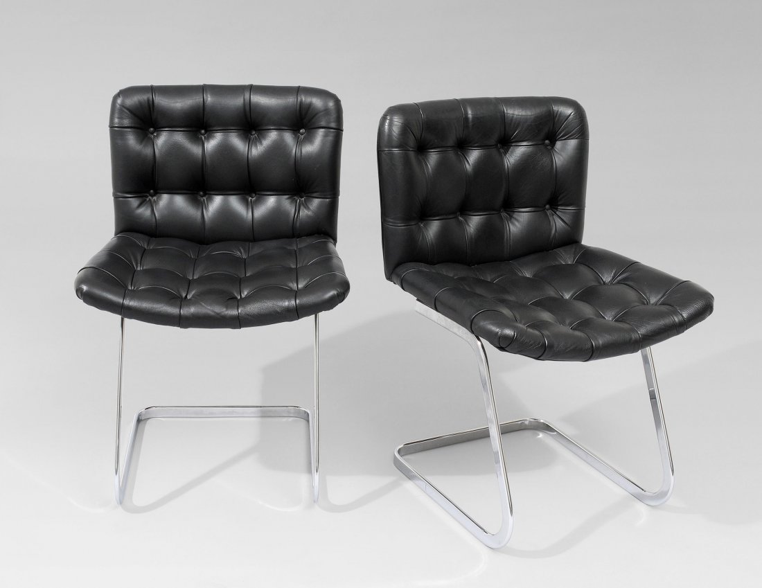 Ein Paar Sessel Design Robert Haussmann, 1959.: Ein Paar Sessel Design Robert Haussmann, 1959. Hersteller De Sede. Freischwinger ohne Armlehnen. Gestell aus Chromstahl und schwarzer Lederbezug. Gebrauchsspuren. Guter Zustand. 78x53x53 cm. SitzhÃ¶