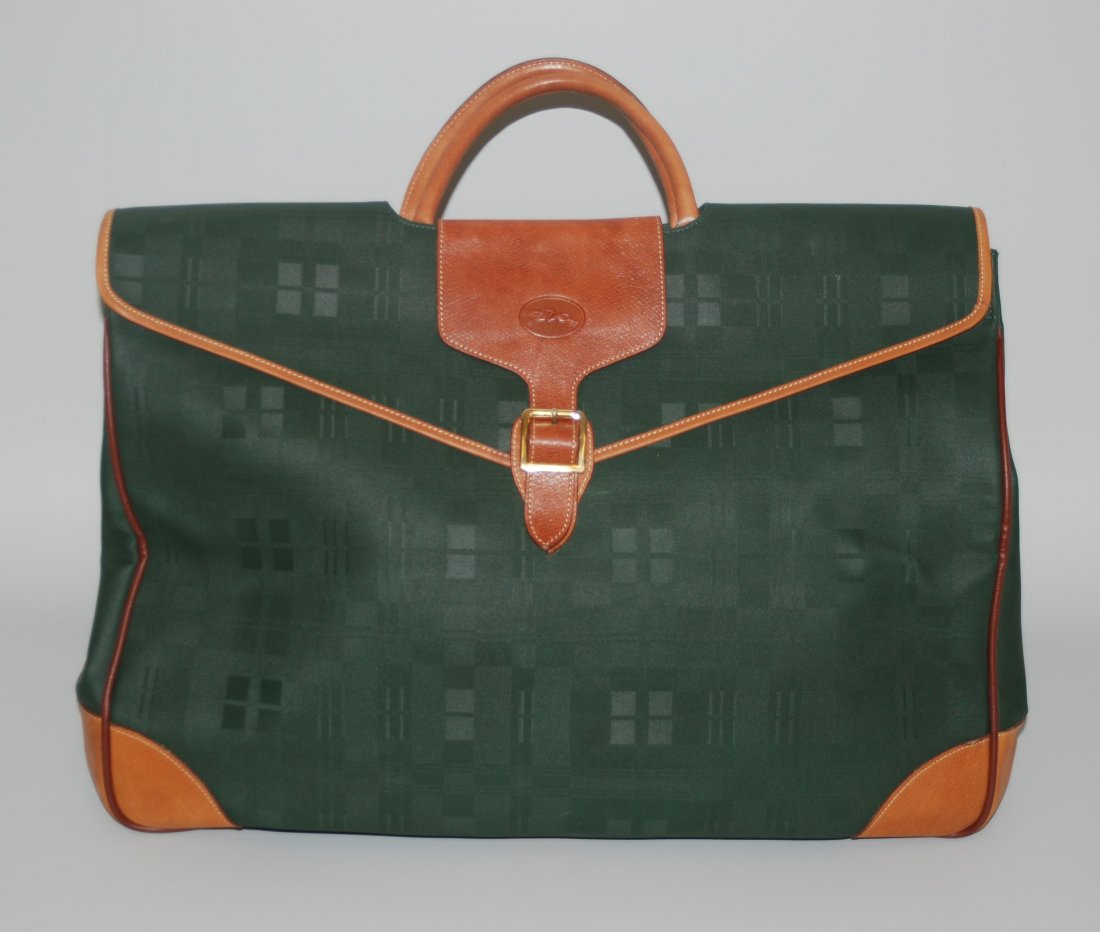 Longchamp, Reisetasche GrÃ¼ner, karierter Stoff mit: Longchamp, Reisetasche GrÃ¼ner, karierter Stoff mit Besatz von naturfarbenem Leder, Doppelhenkel und GÃ¼rtelveschluss. 55x25x40 cm. Gebrauchsspuren.