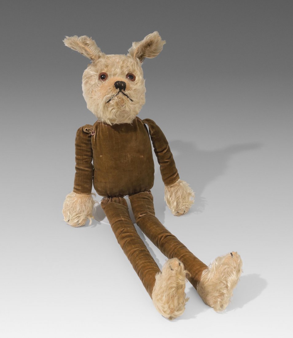 Steiff-Molliette Deutschland, um 1930. Mollykopf,: Steiff-Molliette Deutschland, um 1930. Mollykopf, Pfoten und Schwanz aus hellem Mohair. Körper mit Schlenkergliedern aus ursprünglich lilafarbenem Samt. Druckstimme defekt. Mit Knopf und Resten eine