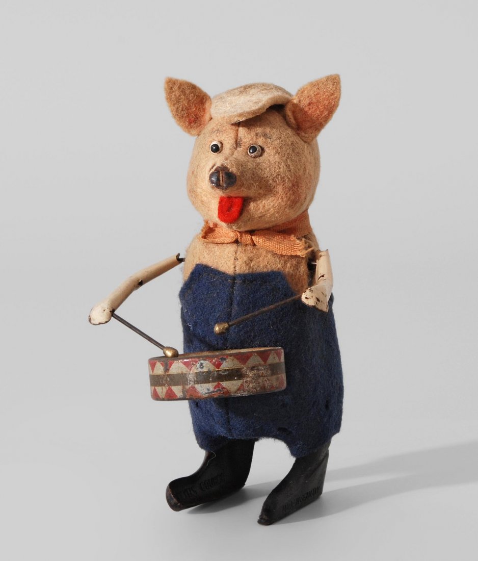 Schuco-Tanzfigur "Schweinchen als Trommler" (1 of 1)