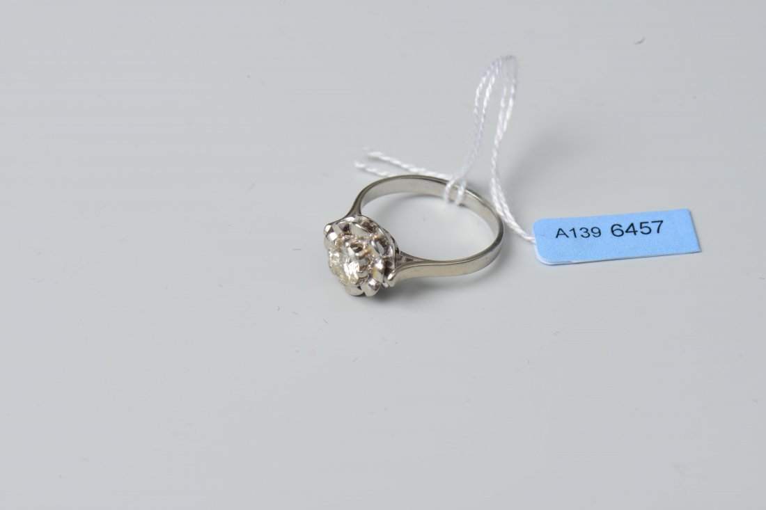 Diamant-Ring 750 Weissgold. Solitaire. 1 Brillant ca.: Diamant-Ring 750 Weissgold. Solitaire. 1 Brillant ca. 0.75 ct, Cape-vs. Gr. 56, 4,7 g.
