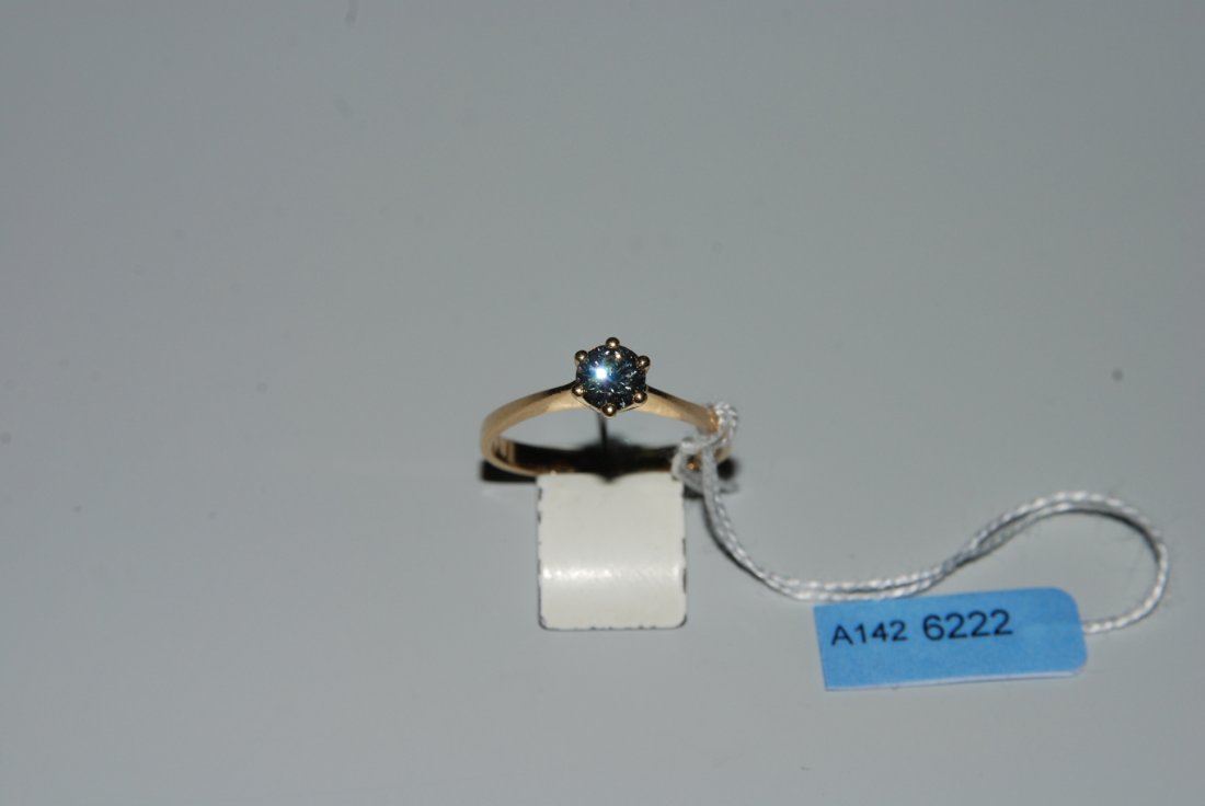 Brillant-Ring Kurz. 750 Gelbgold. Solitaire. 1 Brillant: Brillant-Ring Kurz. 750 Gelbgold. Solitaire. 1 Brillant ca. 0.60 ct, G/H-vs/si. Gr. 56, 3 g.
