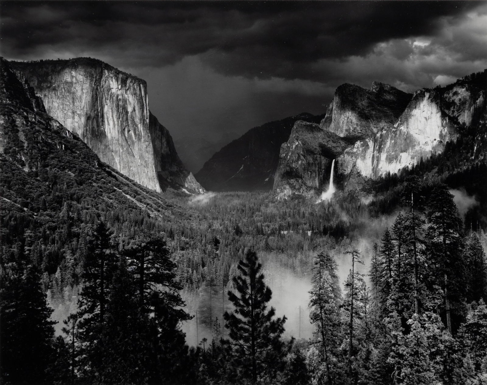 Ansel Adams (Am. 1902-1984), "Thunderstorm" Yosemite Valley, 1949, Gelatin silver print, framed: Ansel Adams (Am. 1902-1984) "Thunderstorm" Yosemite Valley, 1949 Gelatin silver print, framed under glass Initialed by printer Alan Gross and stamped by the Ansel Adams Publishing Rights Trust on b