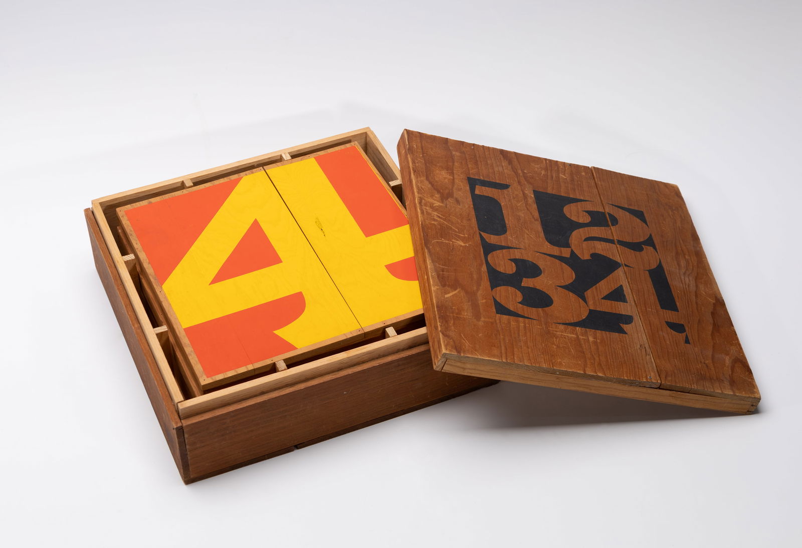 Robert Indiana (Am. 1928-2018), Numbers, 1966, Set of 4 color screenprints on wood panels in wood: Robert Indiana (Am. 1928-2018) Numbers, 1966 Set of 4 color screenprints on wood panels in wood box with screenprint lid Box: Signed, dated, and editioned "8/50" on interior of coverPanels: Each si
