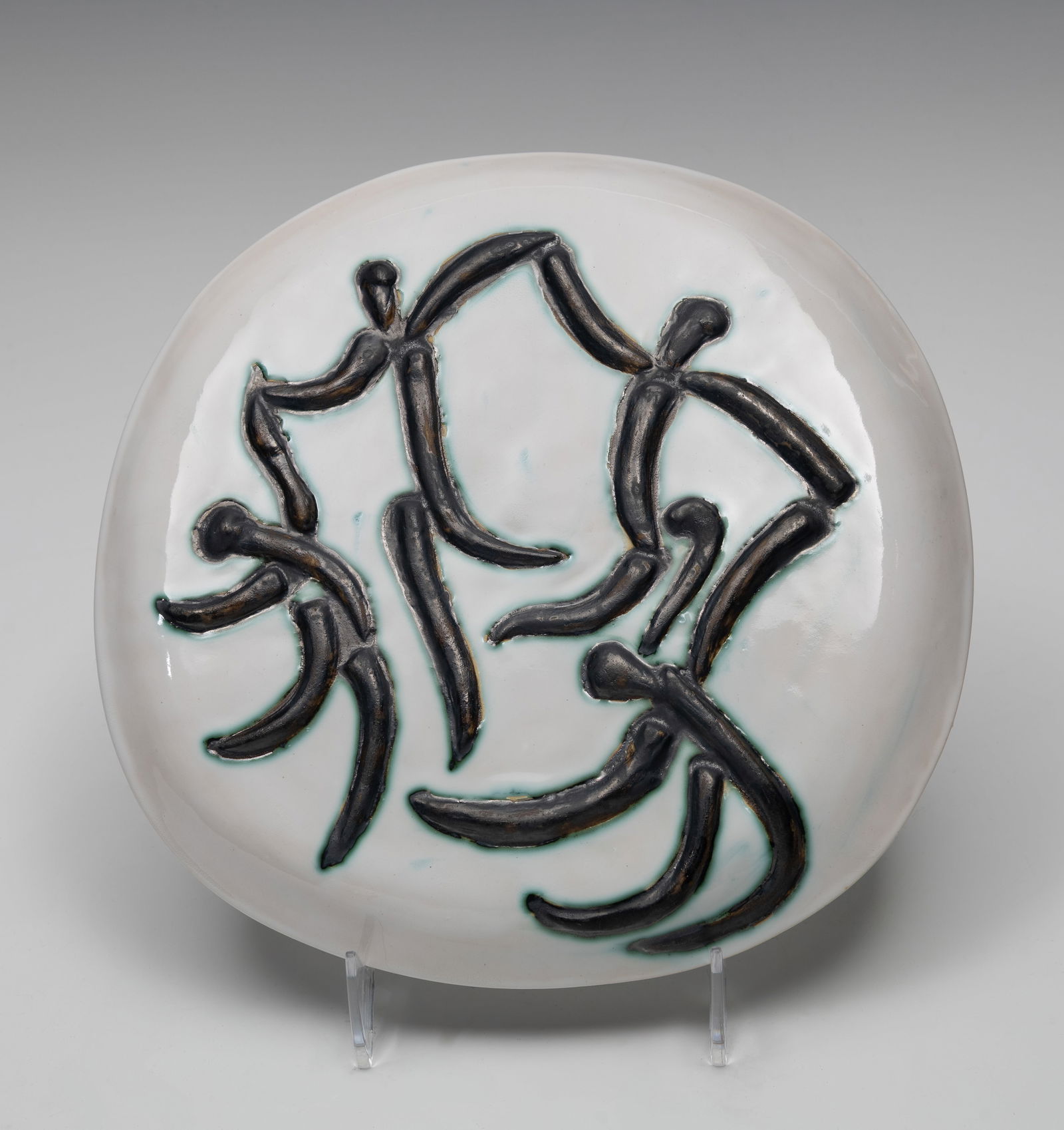 Pablo Picasso (Sp. 1881-1973), Four Dancers, Ceramic with black oxide, colored engobe, and glaze: Pablo Picasso (Sp. 1881-1973) Four Dancers Ceramic with black oxide, colored engobe, and glaze Unsigned, empreinte Originale de Picasso stamp on verso 10 1/4" diameter Prove