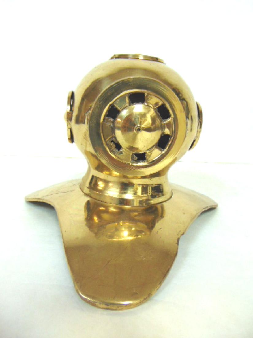 DECORATIVE BRASS NAUTICAL DIVING HELMET DESK SIZE: A DECORATIVE BRASS DIVING DIVING HELMET THAT MEASURES 6 1/4" TALL BY 9" LONG. CONDITION IS GOOD BUT IT DOES HAVE SOME MINOR WEAR. STILL A NICE LITTLE DECORATORS PIECE. SHIPPING AND HANDLING IS $10 WIT