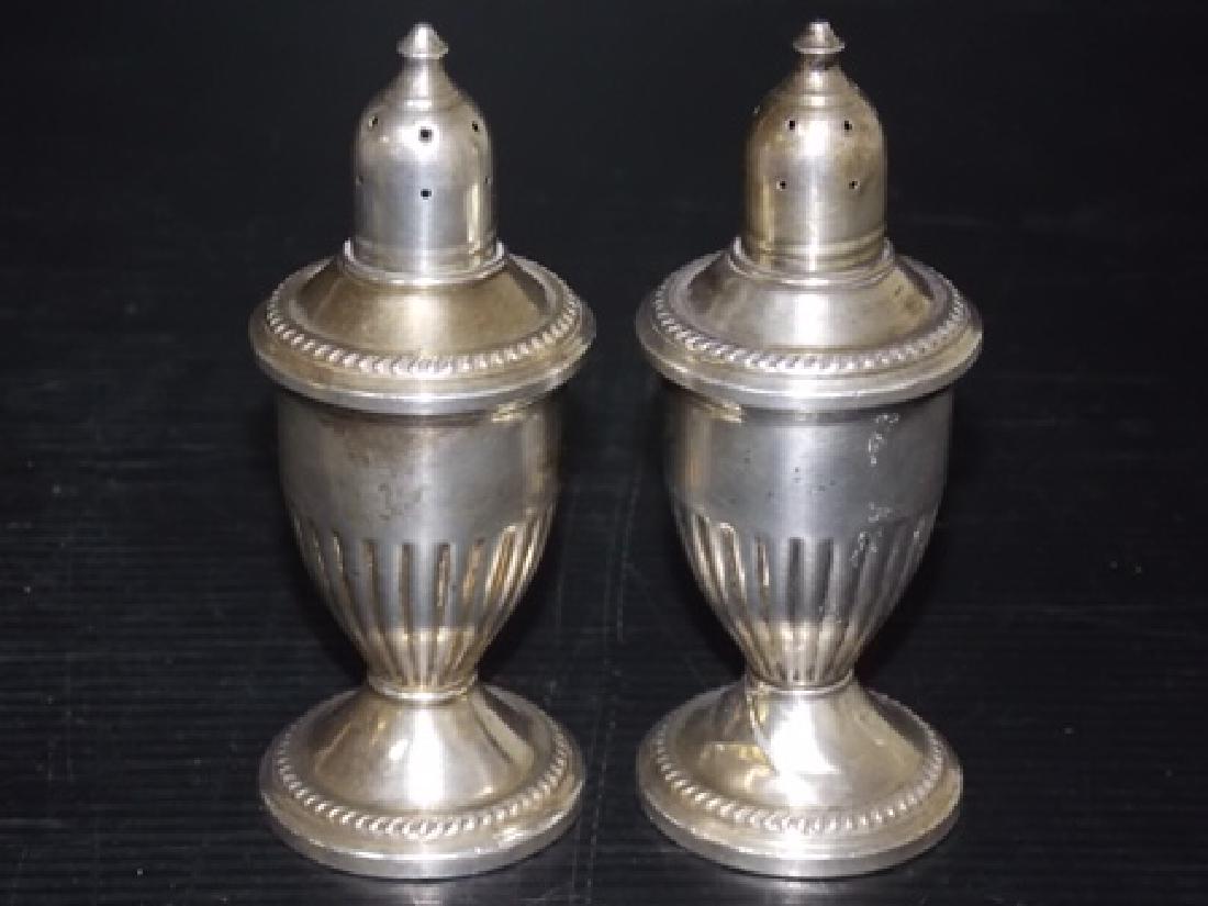 ANTIQUE STERLING SILVER SALT PEPPER SHAKERS: A WONDERFUL PAIR OF VICTORIAN STYLE ANTIQUE STERLING SILVER SALT & PEPPER SHAKERS. EACH SHAKER MEASURES 4 3/4" TALL WITH A 1 7/8" DIAMETER BASE. THEY ARE IN GOOD CONDITION FOR THEIR AGE BUT THE ONE HA