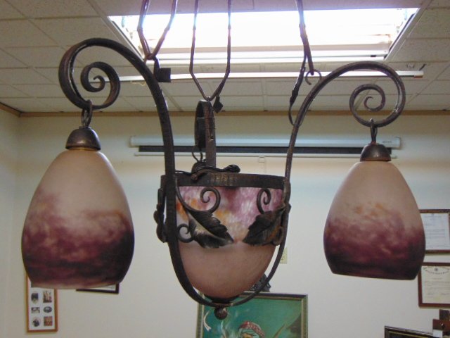 ANTIQUE FRENCH ART DECO DEGUE HANGING LIGHT: AN INCREDIBLE ANTIQUE FRENCH ART DECO WROUGHT IRON HANGING LIGHT THAT WAS MADE BY DEGUE. LIGHT MEASURES ROUGHLY 37" TALL BY 15" WIDE. CONDITION IS VERY NICE. LIGHT HAS BEEN REWIRED SINCE THE PICS WERE