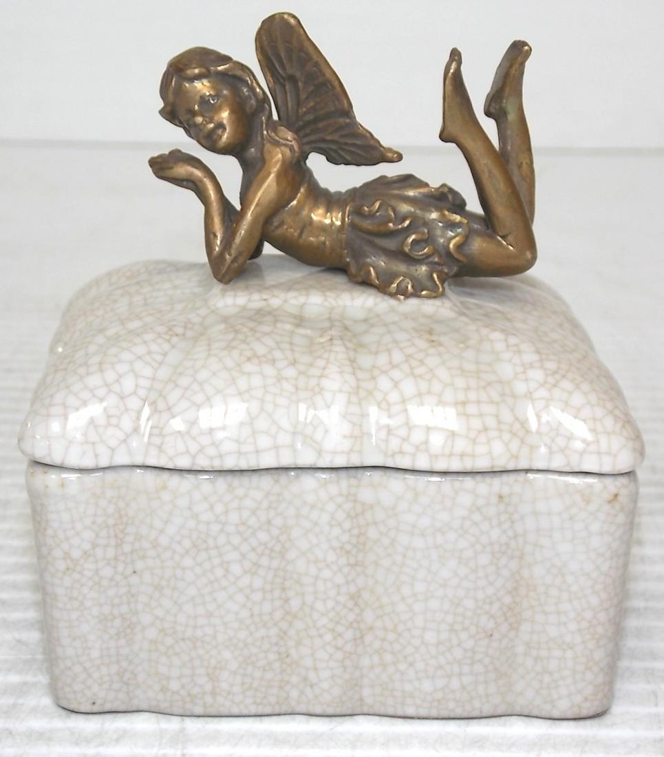 Porcelain Floral Vanity Trinket Box w/ Bronze Fairy: A FLORAL PORCELAIN VANITY BOX WITH A BRONZE FAIRY. THE BOX MEASURES ABOUT 4 1/4" TALL BY 4 1/4" LONG BY 3 1/2" WIDE. SHIPPING AND HANDLING IS $15, ALL OTHER STATES AND COUNTRIES PLEASE CONTACT FOR SHI