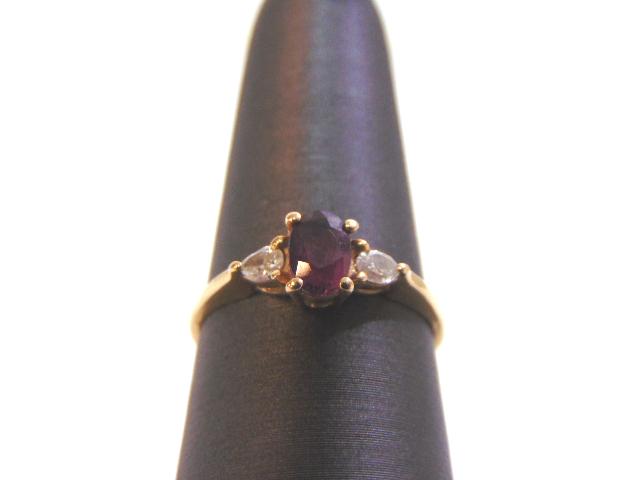Womens Vintage Estate 14k Gold Garnet & Diamond Ring: THIS ITEM IS A WOMENS VINTAGE ESTATE 14K GOLD GARNET & DIAMOND RING. RING IS MARKED ON THE INSIDE "CID 14KP". THE SIZE OF THE RING IS A 7.0. RING WEIGHS 2.0g AND THERE ARE ABOUT .04cts OF DIAMONDS. NO