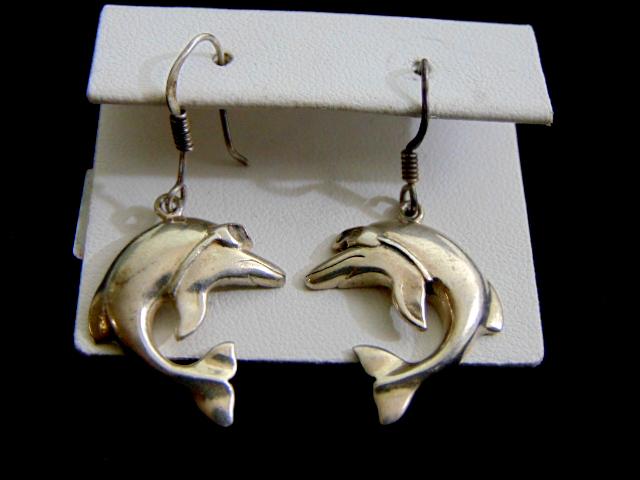 Womens Vintage Sterling Silver Dolphin Earrings: FOR SALE IS PAIR OF STERLING SILVER DOLPHIN EARRINGS THAT WEIGH 6.2g, AND MEASURE 1 3/8" LONG BY 3/4" WIDE. MAKES A GREAT GIFT FOR THAT SOMEONE SPECIAL. ANY OTHER QUESTIONS, PLEASE ASK. BE SURE TO CHE