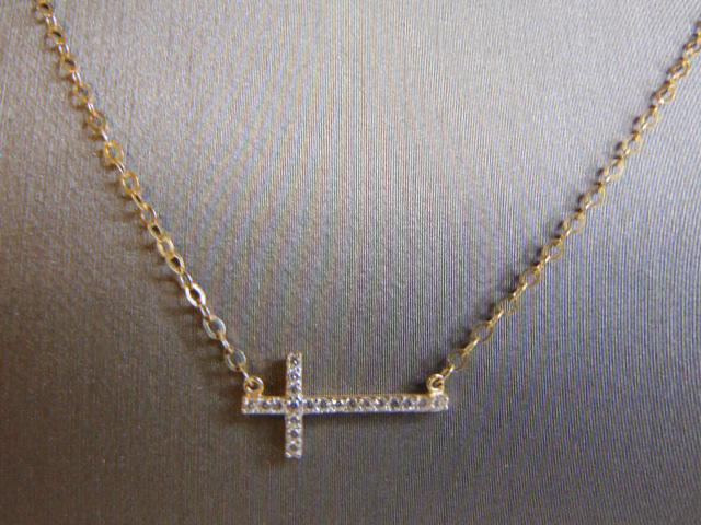 Vintage 14K Gold Necklace w/ Religious Cross Pendant: FOR SALE IS THIS LOVELY VINTAGE 14K GOLD NECKLACE WITH A GOLD CROSS PENDANT THAT HAS EITHER CRYSTAL CHIPS OR CZ CHIPS IN IT. THE TOTAL WEIGHT IS 1.5g. THE NECKLACE MEASURES ABOUT 16 1/2" LONG AND THE