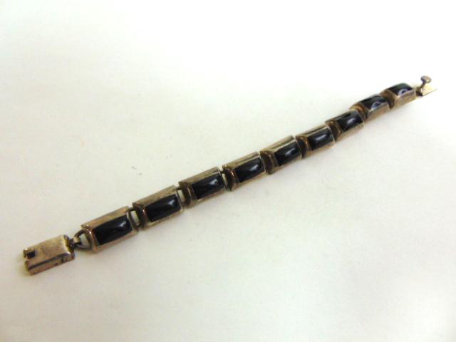 Vintage Estate .925 Sterling Silver Bracelet: THIS ITEM IS A VINTAGE .925 STERLING SILVER BRACELET WITH ONYX OR MARCASITE. BRACELET IS 7 1/4" LONG BY 3/8" WIDE. THIS WOULD MAKE A LOVELY GIFT. ANY OTHER QUESTIONS PLEASE ASK. BE SURE TO CHECK OUT S