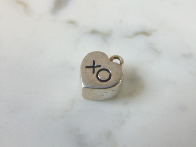 Womens Vintage Sterling Silver Love Heart Charm: FOR SALE IS THIS LOVELY VINTAGE STERLING SILVER HEART CHARM. THE PENDANT WEIGHS 3.1g, AND MEASURES 1/2" BY 1/2" LONG. NOT SURE WHO THE MAKER IS BUT IT IS STAMPED. JUST NEEDS A SMALL HOOP FOR THE BRACE