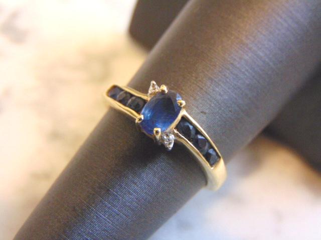 Womens Vintage Estate 14k Gold Diamond Sapphire Ring: A WOMENS VINTAGE ESTATE 14K GOLD DIAMOND SAPPHIRE RING. THE SIZE OF THE RING IS A 6.25, AND WEIGHS 2.4g. THERE ARE ABOUT .02cts. ANY OTHER QUESTIONS PLEASE ASK PRIOR TO BIDDING. BE SURE TO CHECK OUT S